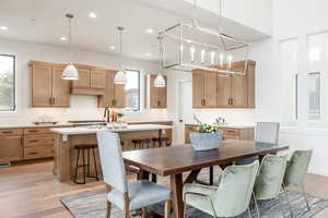 Dining space featuring light wood-type flooring