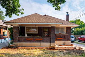 Bungalow-style home featuring a porch