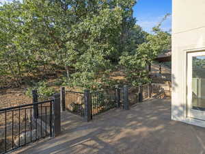 Deck with view of wooded lot