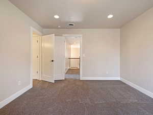 Bedroom featuring carpet flooring