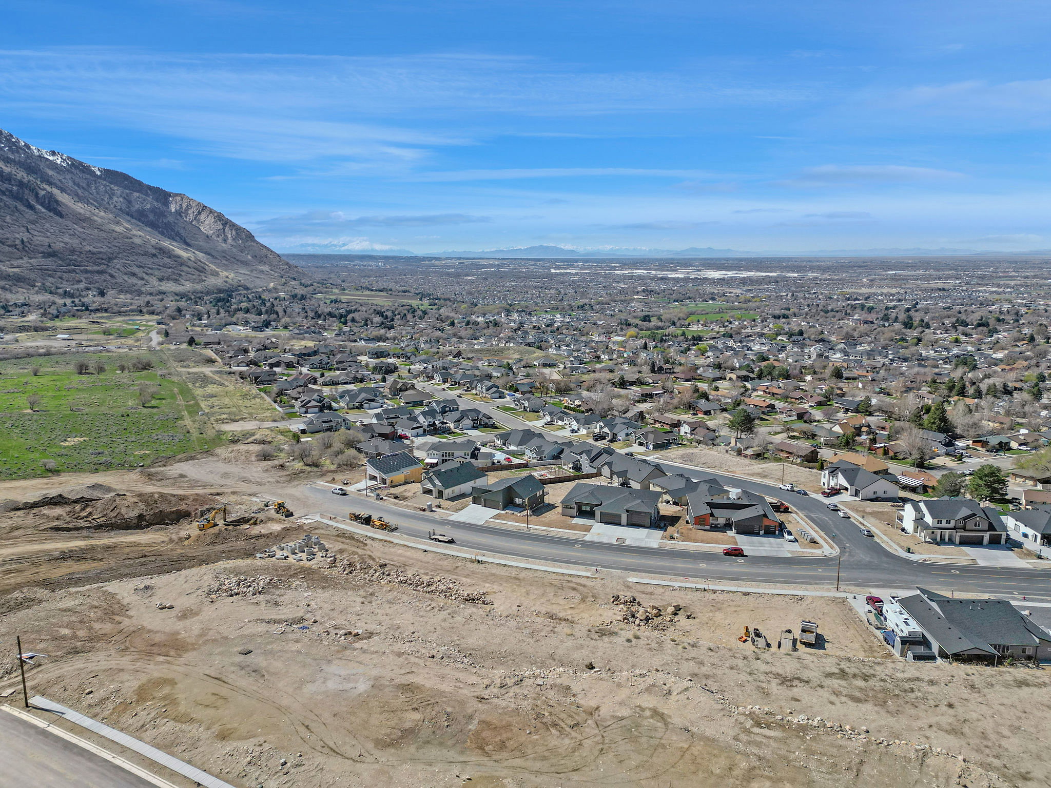 Drone / aerial view featuring a mountain view and a residential view