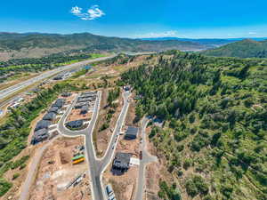 Birds eye view of property featuring a mountain view