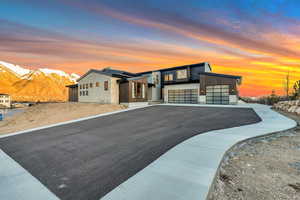 View of front of house with a 360 mountain view