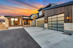 Contemporary entrance and large driveway