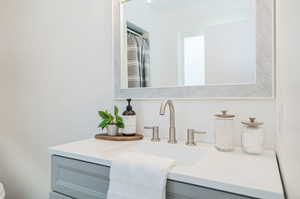 Bathroom featuring toilet and vanity