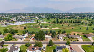 Birds eye view of property with a mountain view