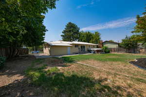 View of yard with a patio