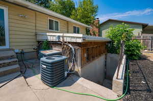 View of patio featuring central AC unit