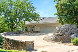 Single story home featuring a garage