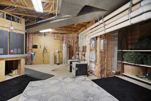 Basement featuring water heater