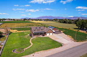 Drone / aerial view featuring a mountain view and a rural view