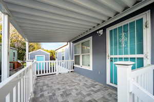 View of patio / terrace with a storage shed