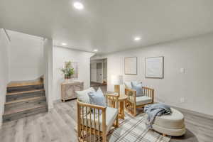 Sitting room featuring light hardwood / wood-style flooring