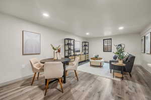 Dining space featuring wood-type flooring