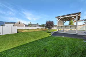 View of yard featuring a pergola