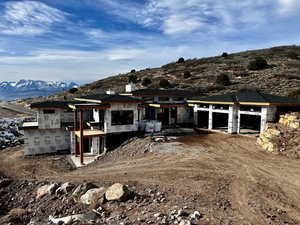 View of front of property with a mountain view