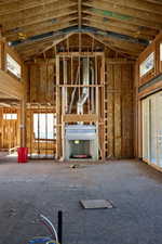 Miscellaneous room featuring high vaulted ceiling