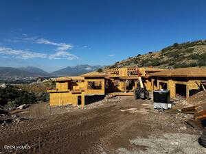 Exterior space featuring a mountain view