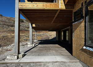 View of patio / terrace with a carport