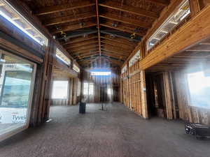 Misc room featuring high vaulted ceiling