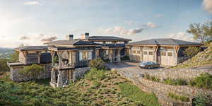 Rear view of house with a garage