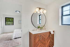 Bathroom featuring double sink vanity