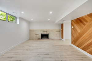 Unfurnished living room with light hardwood / wood-style flooring