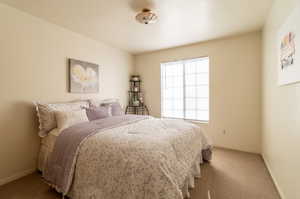 View of carpeted bedroom