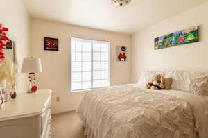 View of carpeted bedroom