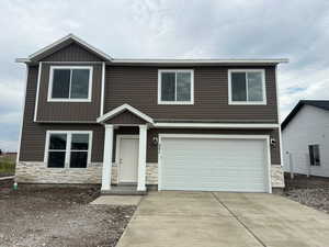 View of front of home with a garage