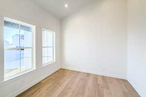 Spare room with light wood-type flooring