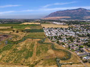 Birds eye view of property with a mountain view