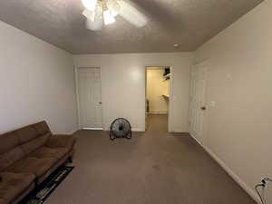 Primary bedroom with doors to 3/4 bath and walk-in closet