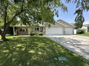 View of front with 3 car garage