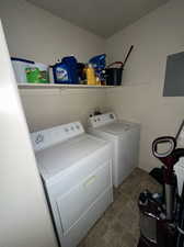 Laundry room with storage shelf