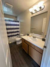 Main full bathroom with brand new shower/tub and flooring