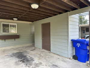 Carport with storage shed