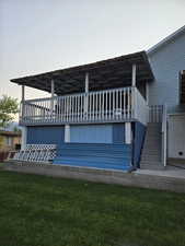 Back of house featuring a deck