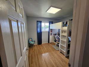 Bedroom featuring light hardwood / wood-style flooring