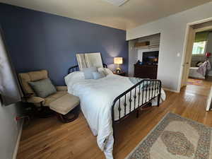 Bedroom featuring hardwood / wood-style floors