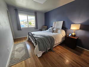 Bedroom featuring hardwood / wood-style flooring