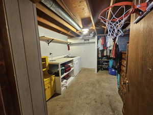 Basement featuring washing machine and clothes dryer