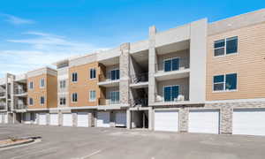 View of property featuring a garage