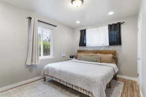 Bedroom featuring light wood-type flooring