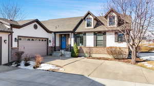 View of front of property with a garage