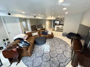 Living room featuring light colored carpet