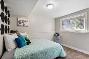 Bedroom featuring carpet flooring