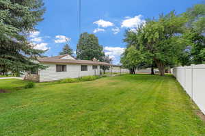 View of yard East side with mature trees