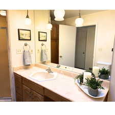 Bathroom with vanity and toilet