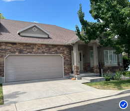 There is a tree in the center, which gives great shade to the home. This  side view shows more.